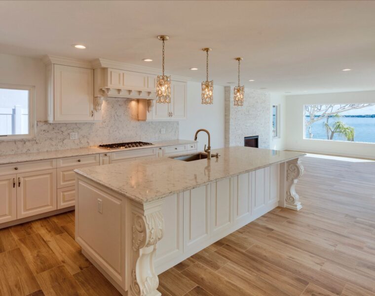 white kitchen with a bayside view