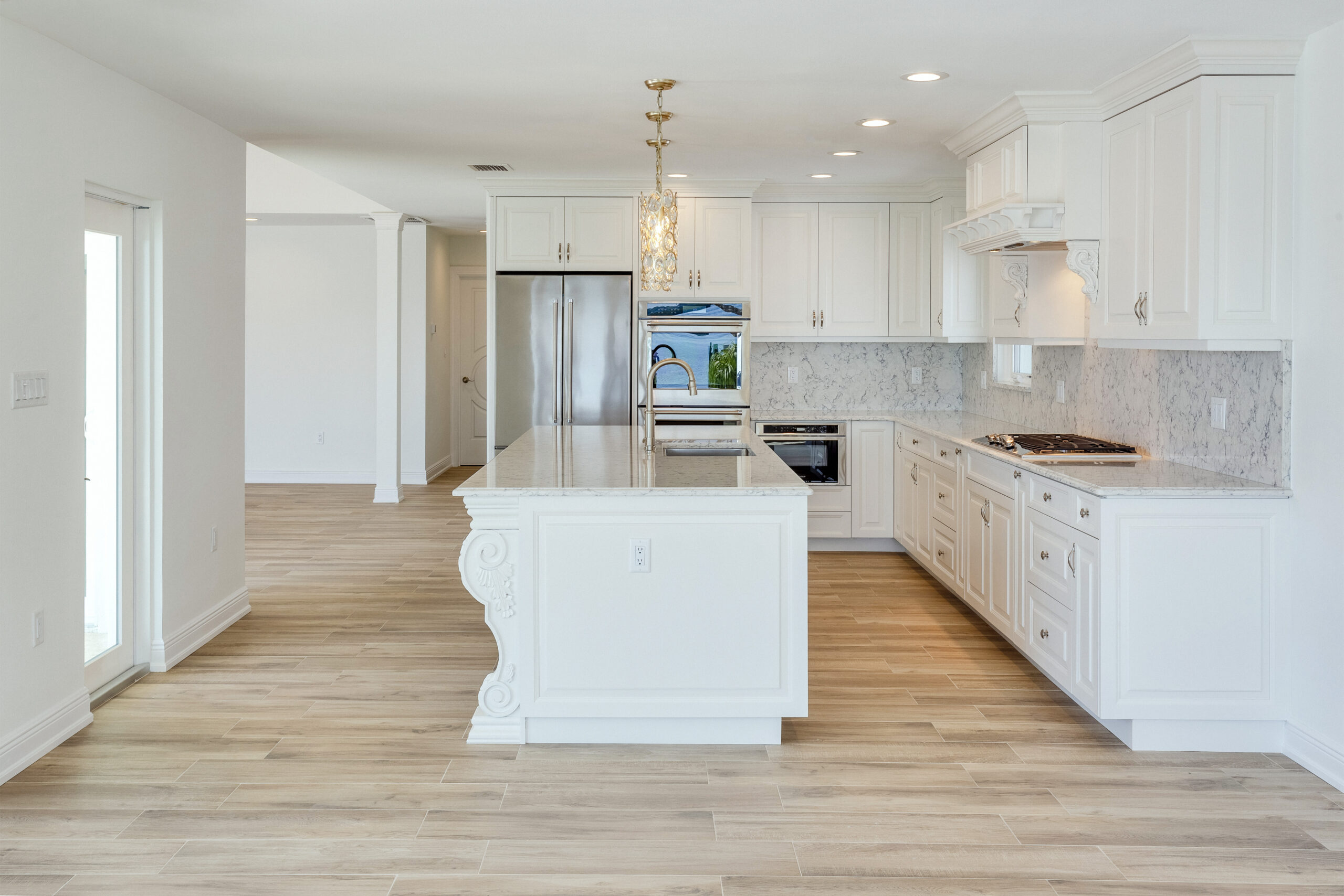 modern white kitchen remodeling in tampa with an open concept